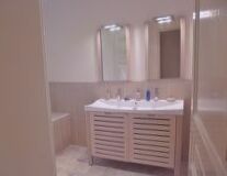 wall, indoor, bathroom, floor, plumbing fixture, shower, bathtub, tap, bathroom accessory, cabinetry, countertop